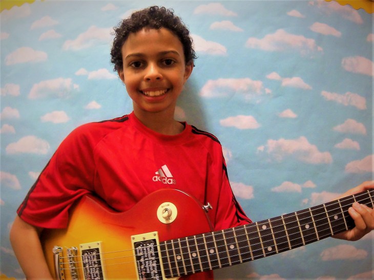 Award guitars use Isaiah.JPG